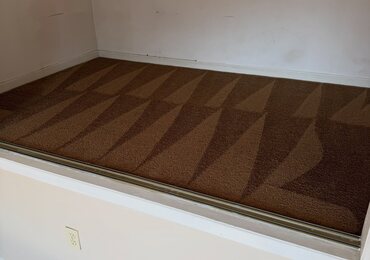 Empty rental unit carpet turned over
